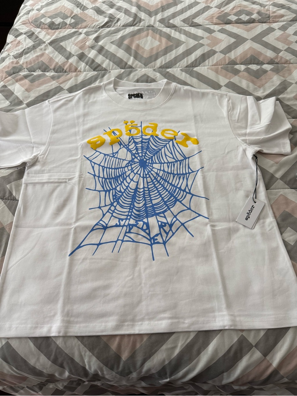 Sp5der White Graphic Tee with Blue Web and Yellow Text